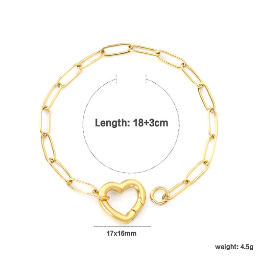 Boucles d’oreilles en acier inoxydable avec fermeture en forme de coeur